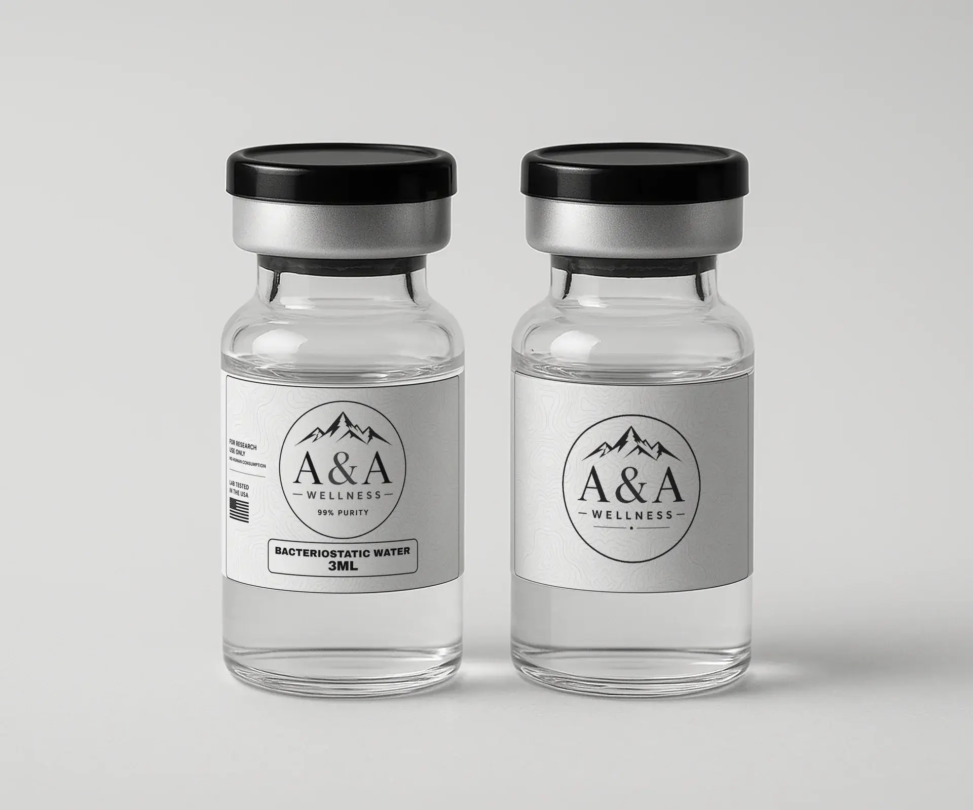 Two liquid-filled A&A Wellness vials, one bacteriostatic water 3mL, on a light gray surface