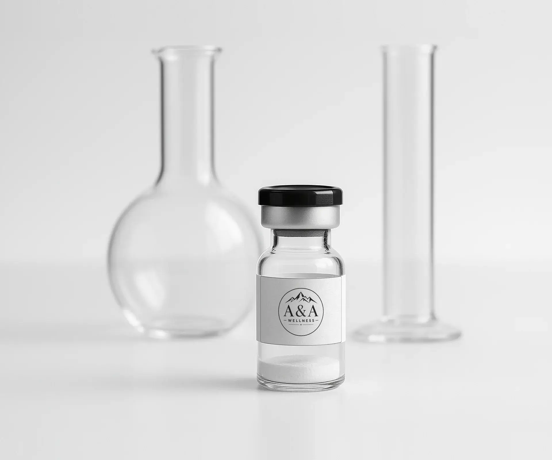 Glass volumetric flask, graduated cylinder and a sealed A&A Wellness vial on a clean lab bench