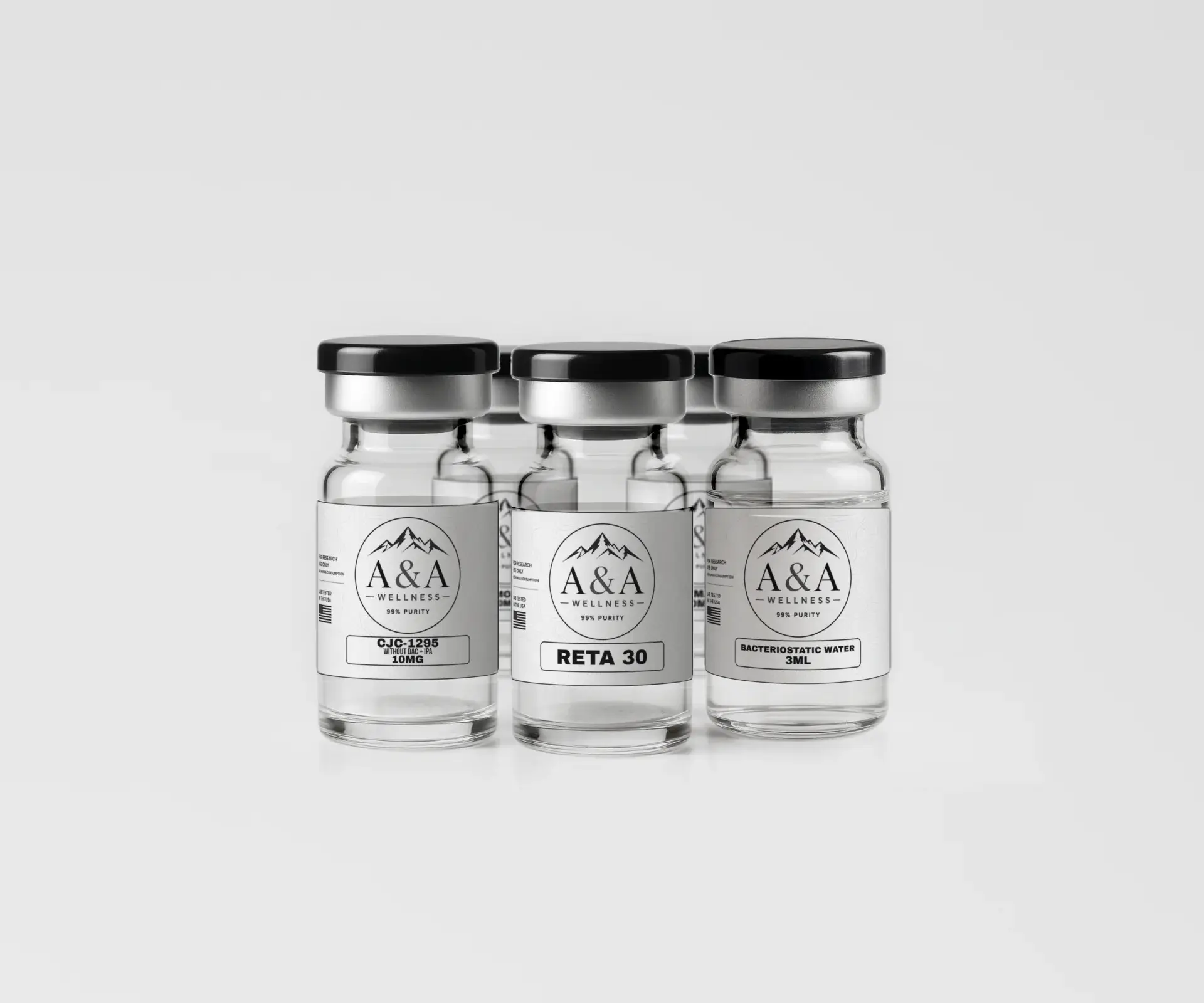 Assorted A&A Wellness research peptide vials arranged on a soft gray surface